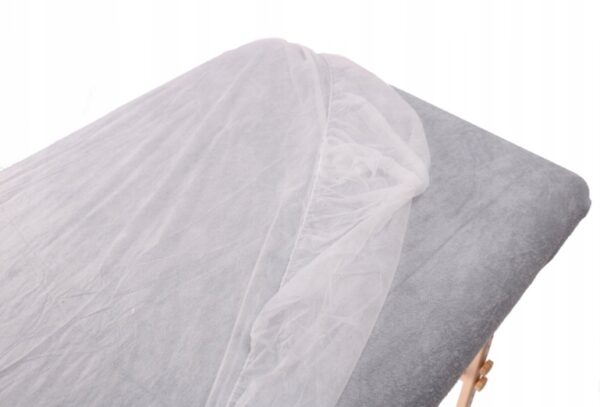 Białe prześcieradło włókninowe z gumką w rozmiarze 200x80 cm. Idealne do użytku w salonie kosmetycznym, SPA, masażu czy fizjoterapii. Opakowanie 10 sztuk. DK01424